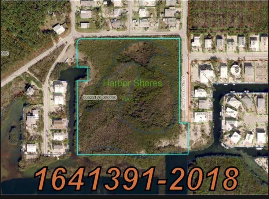 Zoned ( NA - Native area ) Exceptional investment opportunity in Key Largo featuring approximately 6.82 acres of land with existing ROGO allocation potential and valuable development considerations within Monroe County. Public records indicate the property currently carries approximately 10 ROGO points, which may provide future development potential subject to county approvals and verification. Property details from county records reflect approximately 1.46 acres classified as Hardwood Hammock (00HH), consisting of environmentally sensitive native tropical hardwood vegetation common throughout the Florida Keys. Portions of this area may be protected or subject to development restrictions depending on Monroe County and environmental regulations. County records also reflect approximately 6.82 acres categorized under acreage land classification (9500), offering a rare opportunity to own a substantial parcel within the Florida Keys market. Existing site improvements include wrought iron yard features/fencing measuring approximately 228 SF installed between 2014-2016 according to public records. This property presents excellent potential for investors, long-term land holders, or buyers seeking a unique Florida Keys acreage opportunity while exploring future development possibilities through Monroe County planning and building departments. Buyer is advised to independently verify all information, including ROGO points, environmental restrictions, zoning regulations, wetlands, utility access, permitted uses, and future building potential with Monroe County and applicable governing authorities.   View attached documents from Monroe County