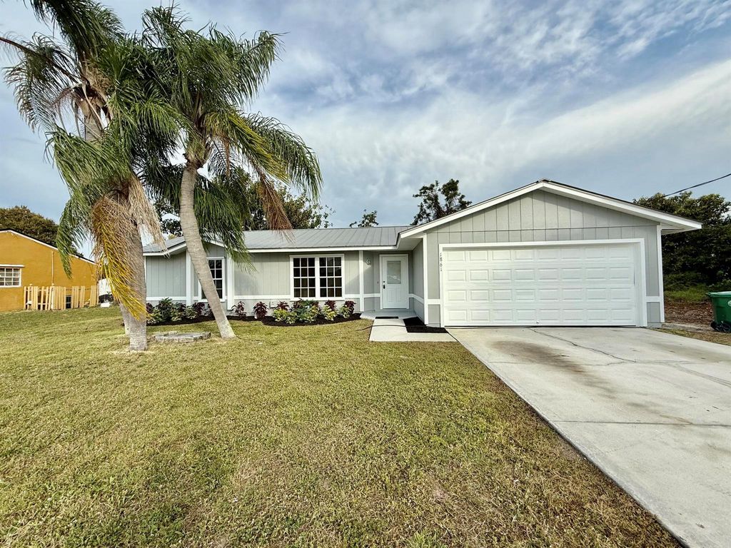 Photo of 1861 SE Mandrake Circle, Port Saint Lucie, FL 34952 (MLS # R11090832)