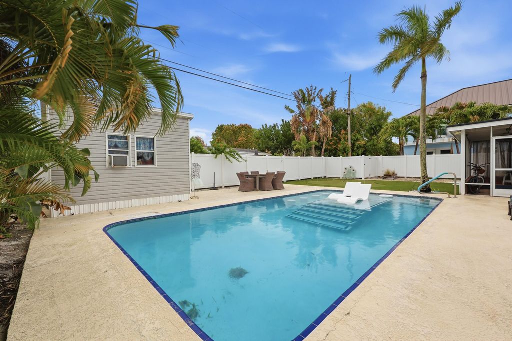 Photo of 1516 Seabrook Road, Jupiter, FL 33469 (MLS # B26004171)