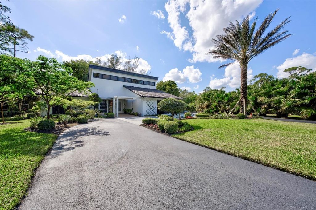 Photo of 5755 NW 65th Terrace, Parkland, FL 33067 (MLS # F10511231)