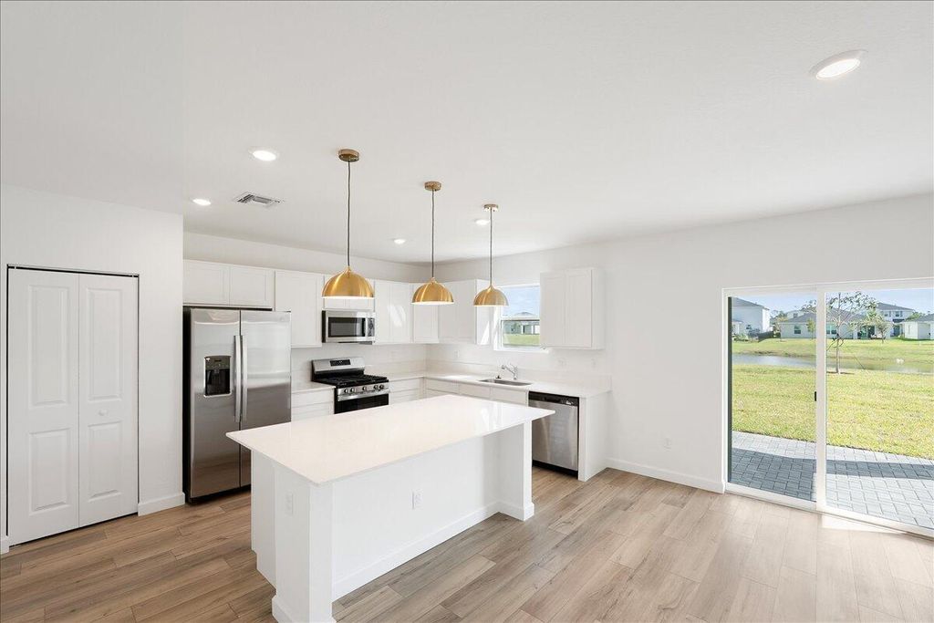 Photo of 6379 NW Windwood Way, Port Saint Lucie, FL 34987 (MLS # R11100493)