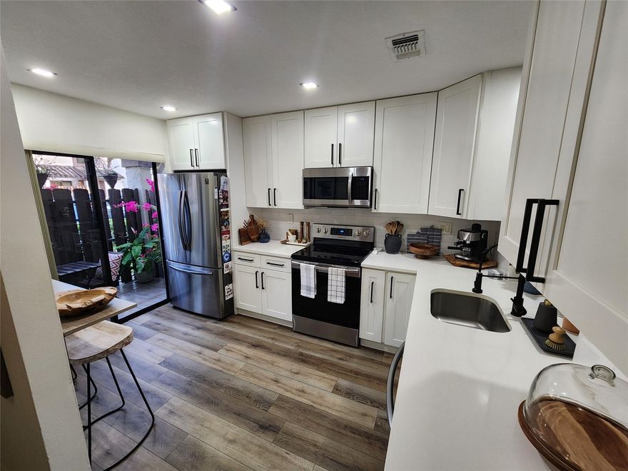 650 min credit score, No FHA Loans. This beautiful townhome is located in NW Lauderhill, on the boarder of Sunrise/Tamarac. Surrounded by a quiet single family home neighborhood w/ 3 parks in walking distance. This recently remodeled townhome features 2 master bedrooms & 2.5 bathrooms. Brand new vinyl floors all throughout. Completely renovated Kitchen & bathrooms, stainless steel appliances, shaker cabinets, & quartz counters. Front Porch includes storage closet. Enjoy sunset views of the lake from the screened in patio. Located near several shops & restaurants. Mins away from all major highways. Roof replaced 2019. 1 assigned parking spot directly in-front of the house and plenty guest parking. HOA includes trash, roof, exterior of building, landscaping, pool, exterior pest-control. HOA includes master insurance plan which covers trash removal, roof, paint, exterior of the building, landscaping, pool maintenace, and exterior pest-control.