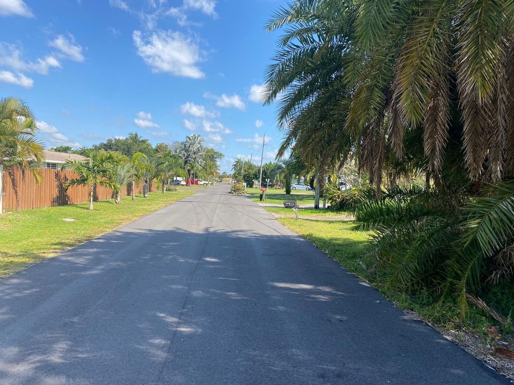 Photo of 1176 W Shore Drive, West Palm Beach, FL 33406 (MLS # R10978209)