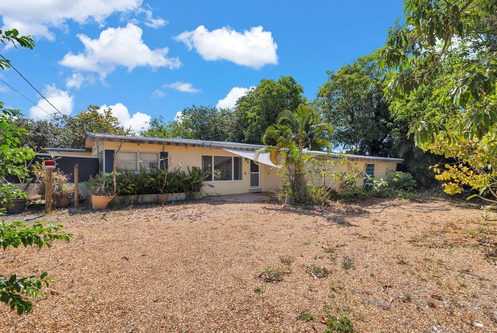 Photo of 1176 W Shore Drive, West Palm Beach, FL 33406 (MLS # R10978209)