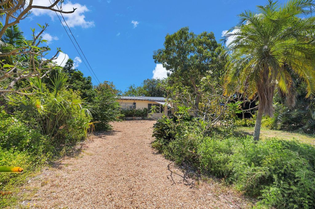 Photo of 1176 W Shore Drive, West Palm Beach, FL 33406 (MLS # R10978209)