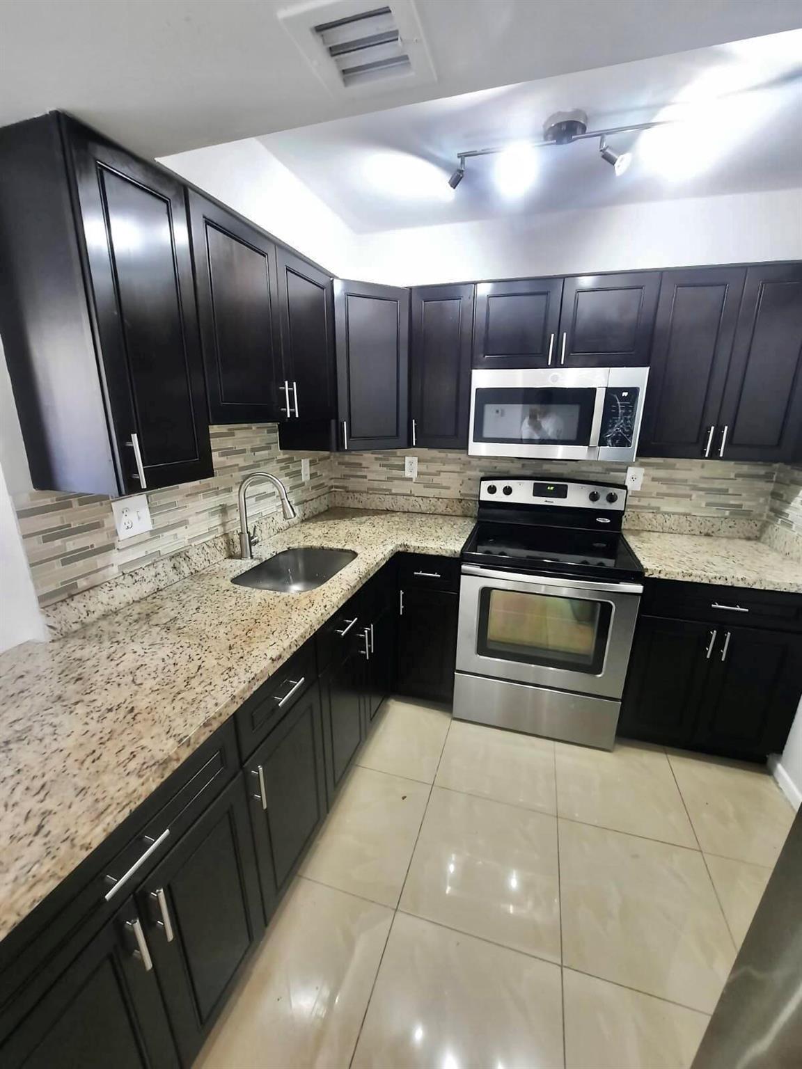 FOR RENT 2 bedrooms 2 bathrooms. Second floor condo.Bright and spacious with balcony. Kitchen with dark wood cabinets and granite countertop- tile flooring through out. Walk in closet. Well-maintained community, with swimming pool, fitness center, hot spa, club house and gym, BBQ area. All Ages- Pet friendly. Absolutely gorgeous views of Lake and downtown. 600 plus CS required by Association. Close to I-95, Tanger Outlet, Whole Foods, Best Buy, Target and restaurants. Within mins of beach and downtown. Rush hoa fee to move in within 4 to 5 days. WATER INCLUDED IN THE RENT !