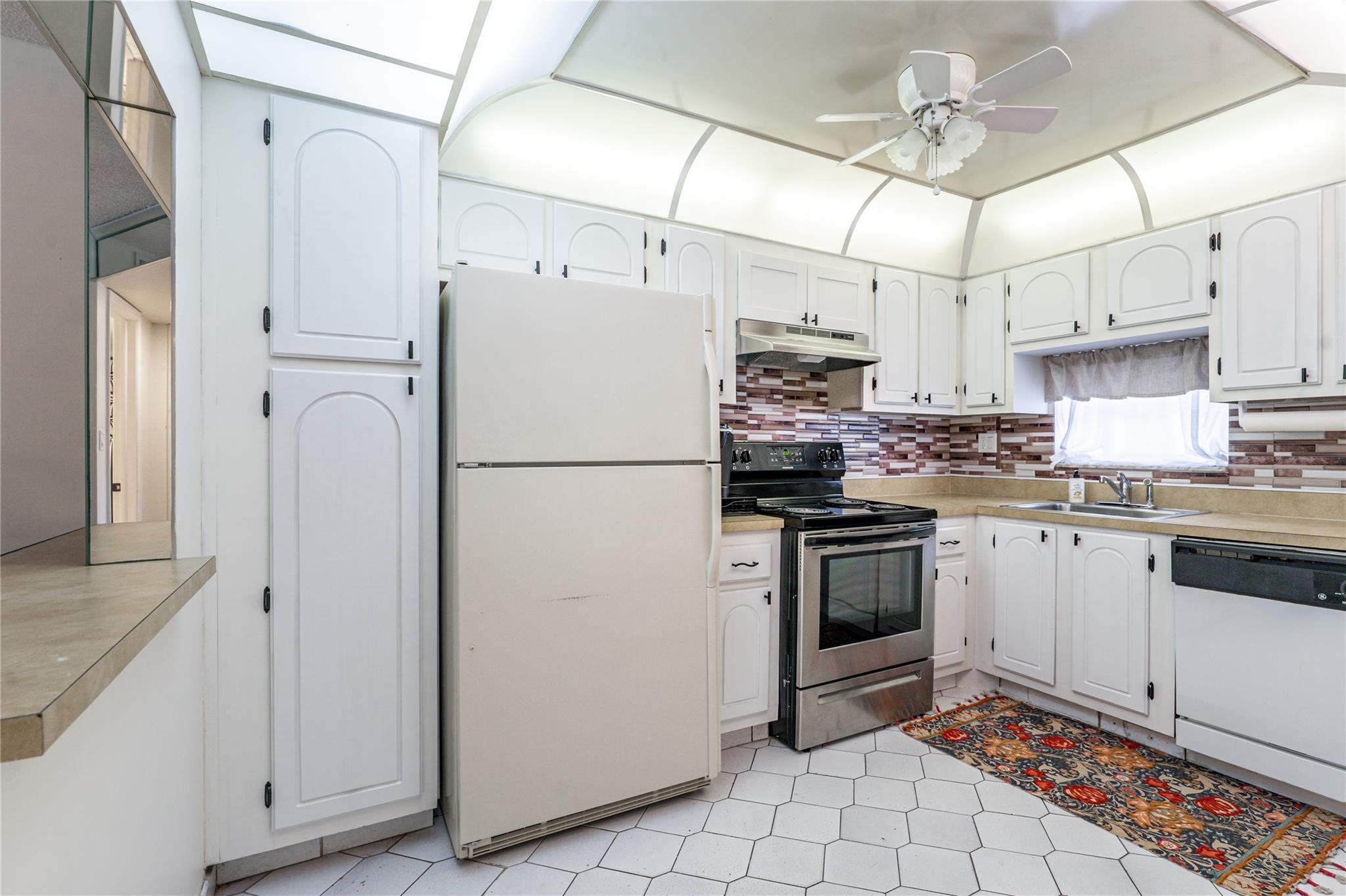 EXCELLENT OPPORTUNITY WELL BELOW ASSESSED VALUE! 2BR/2BA. FREE golf (except cart fees) on two 18 hole courses (PGA & Par3) PERFECT FOR GOLFERS! Recreation Lease under $3,000 a year is far less than joining a Golf Club. Convenient 1st floor; parking space right in front. North-South exposure with SPECTACULAR WIDE WATER VIEW! Amenities include Restaurant, Billiard Room, Bbq/Picnic Area, Clubhouse, Courtesy Bus, Exercise Room, Heated Pool, Library, Putting Green, Sauna, Shuffleboard, Tennis, Pickle Ball, Vehicle Wash Area, Electric Car Charging Station. Close to shopping, dining & highways. 15 min. to the beach. LOW LOW PRICE REFLECTS GREAT OPPORTUNITY!