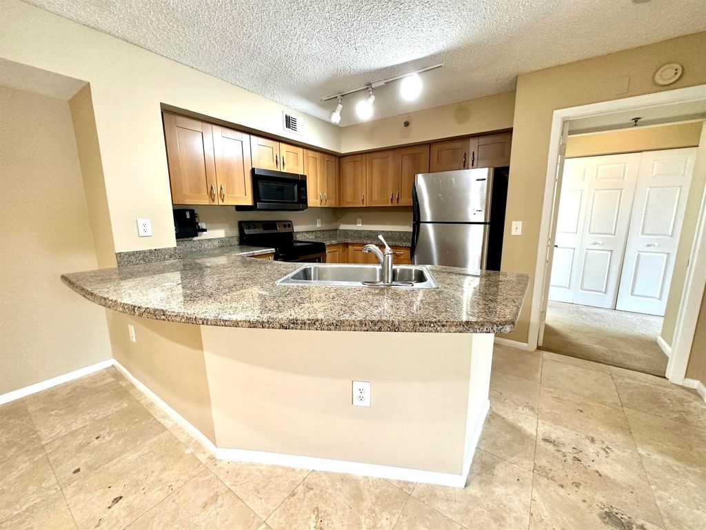 Photo of 3209 Clint Moore Road #105, Boca Raton, FL 33496 (MLS # R11126823)