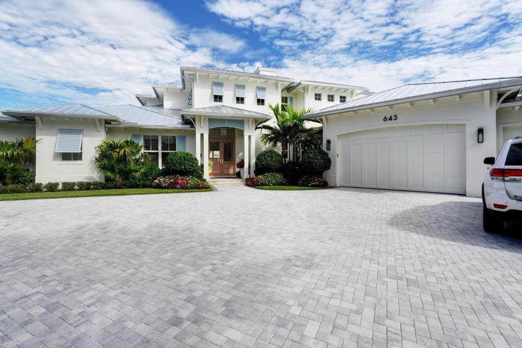Photo of 643 Pilot Road, North Palm Beach, FL 33408 (MLS # R11152962)
