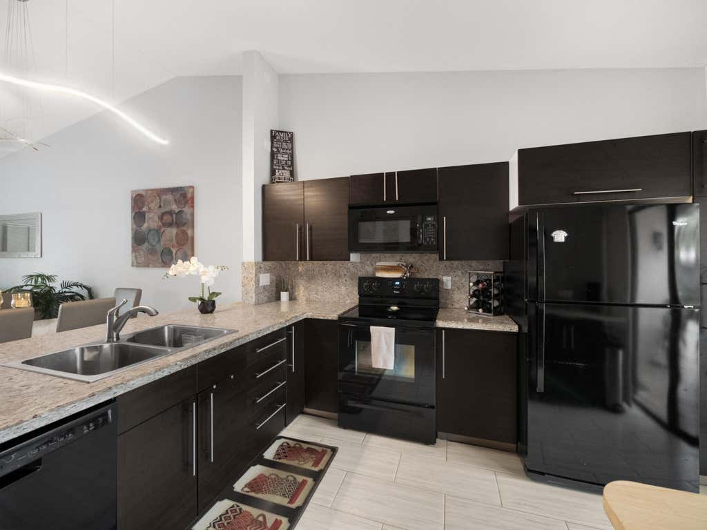 Photo of 5217 E Lakes Drive, Deerfield Beach, FL 33064 (MLS # R10942533)