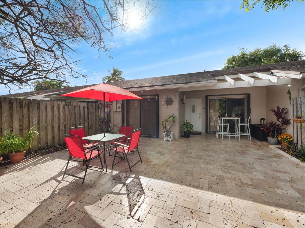 Photo of 5217 E Lakes Drive, Deerfield Beach, FL 33064 (MLS # R10942533)