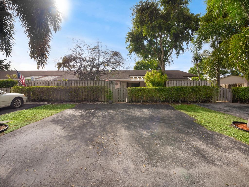 Photo of 5217 E Lakes Drive, Deerfield Beach, FL 33064 (MLS # R10942533)