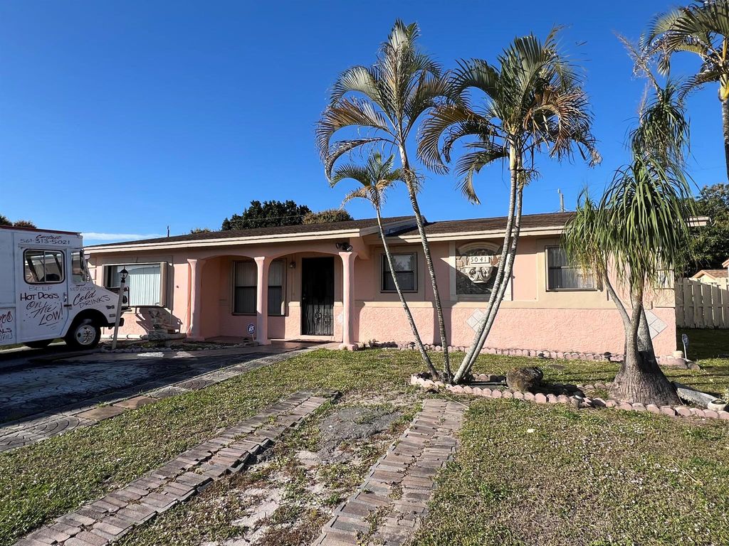Photo of 5041 Pat Place, West Palm Beach, FL 33407 (MLS # R10944965)