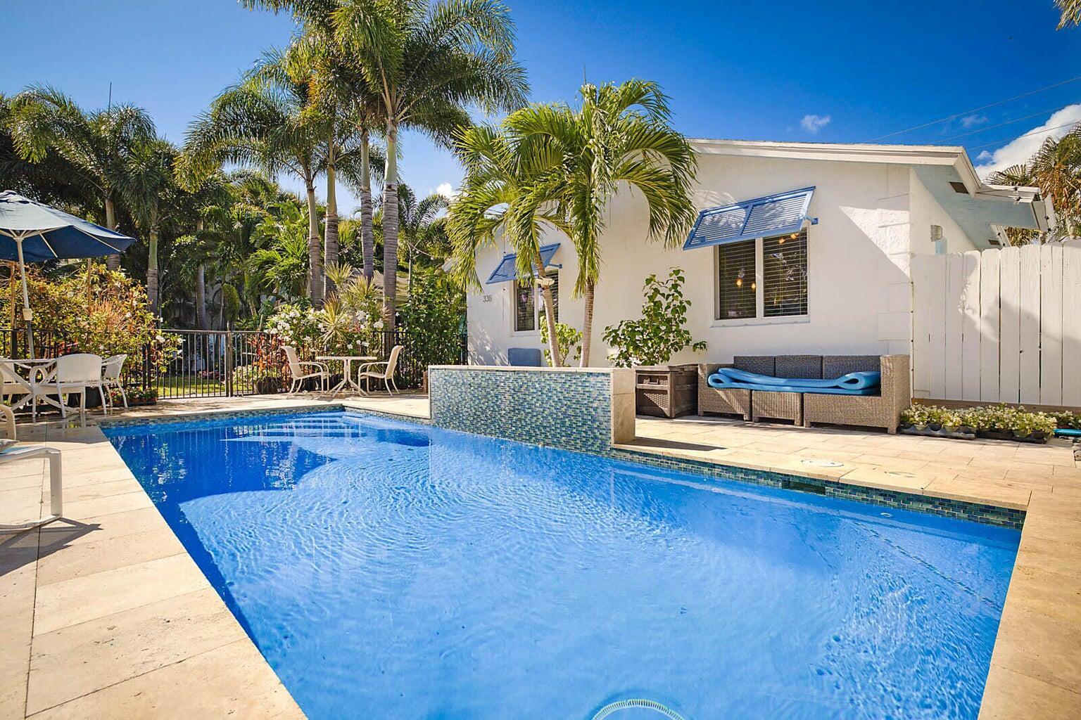 Experience the Delray Beach lifestyle in this private 2-bedroom villa with a large saltwater pool, located in the highly sought-after Palm Trail neighborhood. This fully furnished, turnkey retreat offers 2 bedrooms and 2 bathrooms, located in a meticulously maintained boutique community offering tranquil living for all residents. A secluded oasis, featuring a spacious outdoor private living area--ideal for entertaining or soaking up the Florida sun. Enjoy direct pool access and a peaceful, resort-style setting just a short walk to the beach and Atlantic Avenue, where you'll find the best of Delray's shopping, dining, and nightlife.Pet-friendly and thoughtfully designed for comfort and convenience--just bring your bags and settle in!