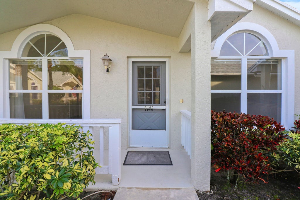 Photo of 1146 NW Lombardy Drive, Port Saint Lucie, FL 34986 (MLS # R10952349)