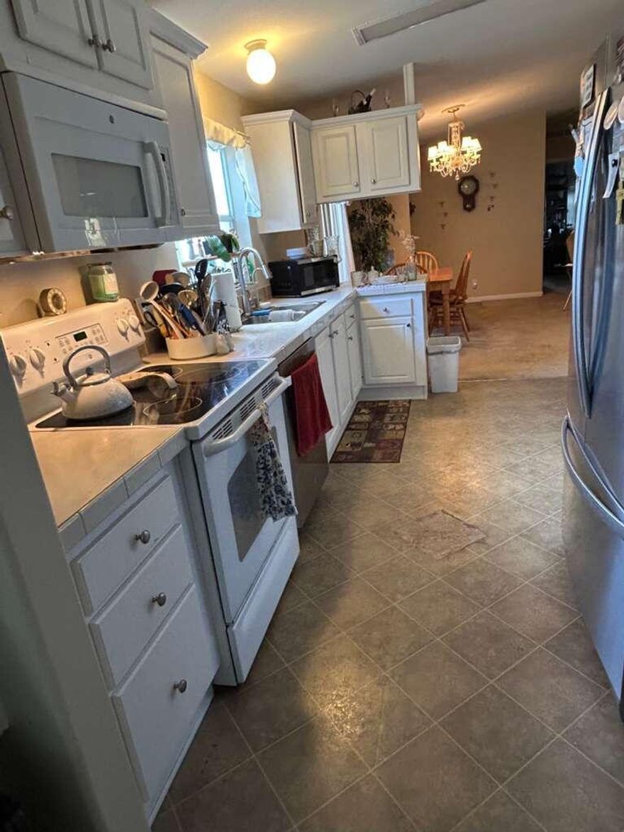 Welcome to A Garden Walk, a beautifully maintained, all-ages community just minutes from beaches and shopping. Our pet-friendly home sites feature mature landscaping and premium amenities, including two pools, a fitness center with a sauna, tennis courts, and a clubhouse with on-site management and RV storage. It's the perfect blend of convenience and relaxation. The home is being sold partially furnished AS IS.