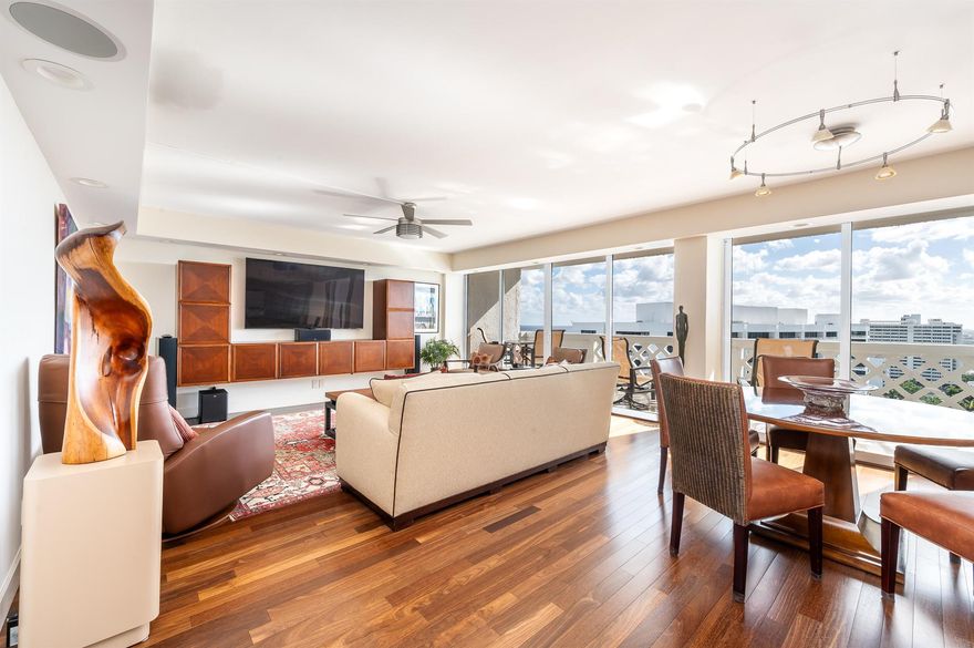 Penthouse G at Cloister Towers presents a rare opportunity to own a renovated oceanfront residence with refined finishes, exceptional light, and an elevated coastal lifestyle. This 2-bedroom, 2-bathroom penthouse offers approximately 1,230 square feet of bright, airy living space with desirable southern, southeastern, and southwestern exposures that flood the home with natural light throughout the day.The residence features windows and balconies on both the south and north exposures, creating exceptional cross-light, enhanced airflow, and a unique sense of openness rarely found in beachfront condominiums.