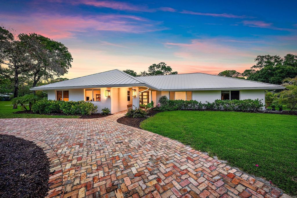 Photo of 6799 Imperial Woods Road, Jupiter, FL 33458 (MLS # R11092488)