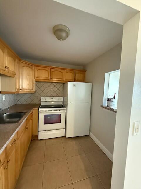 This FIRST-floor home has brand new LTV Flooring throughout. Has bee freshly painted with 2 new AC units. It has 1 large bedroom with 1.5 Baths. It is unfurnished with ceramic flooring in kitchen and baths. Century Village has numerous amenities offered to its residents. Manned Gate for security,100 Seat auditorium shows & movies, Close to PBI airport beaches and restaurants. Private Bus system throughout the community