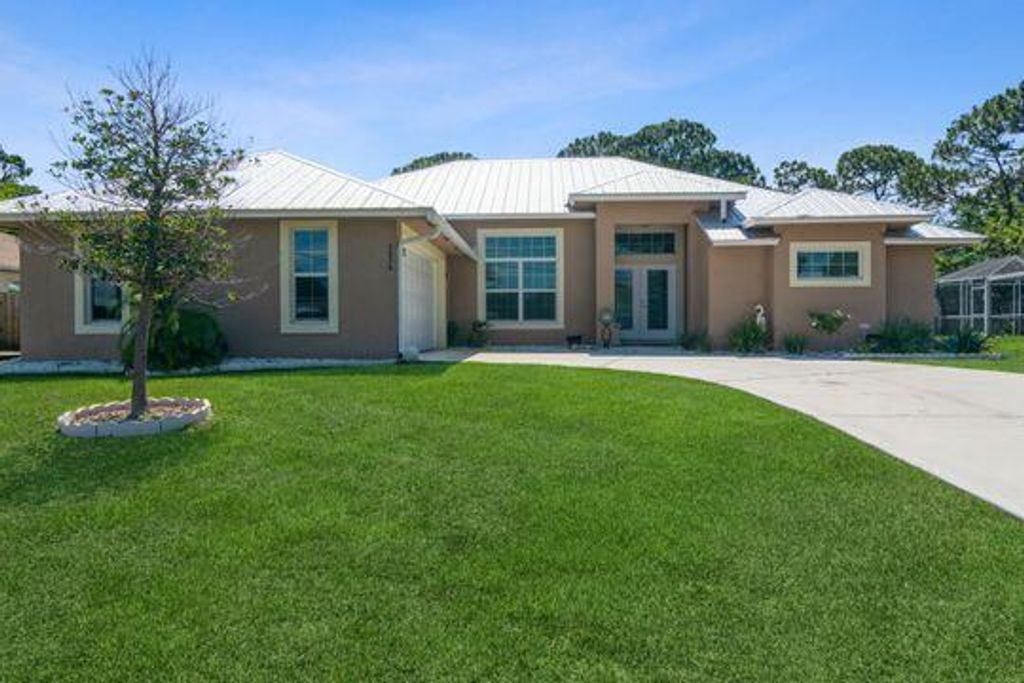 Photo of 4026 SW Brunswick Street St, Port St Lucie, FL 34953 (MLS # R10799295)