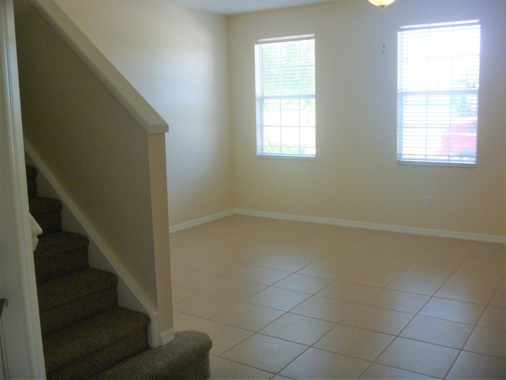 Photo of 1886 SE Interlachen Drive, Port Saint Lucie, FL 34952 (MLS # R10993241)