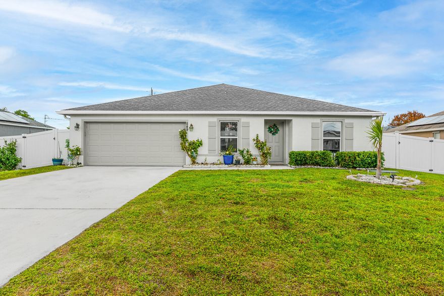 Let's Make a Deal/ Motivated Seller. Check Out This 2022 Built, 4 Bed, 2 Bath, 2 Car Garage Fully Fenced CBS Home. Bright Open Floor Plan with a Spacious Living Area, Modern Recessed Lighting, and Neutral Finishes Throughout. The Kitchen Offers Stainless Steel Appliances, Ample Cabinetry, and a Large Island Overlooking the Main Living Space. An Indoor Laundry Room, Waterproof Vinyl Flooring and Carpeting. Large Completely Fenced Backyard and Convenient Location: Situated in a Desirable Neighborhood of Port Saint Lucie, Close to St Lucie West, Crosstown, Mets Stadium, Turnpike, This Home Offers Easy Access to Shopping, Dining, Beaches, Parks, Schools, Hospitals and More! No Deed Restrictions or HOA! Call Today