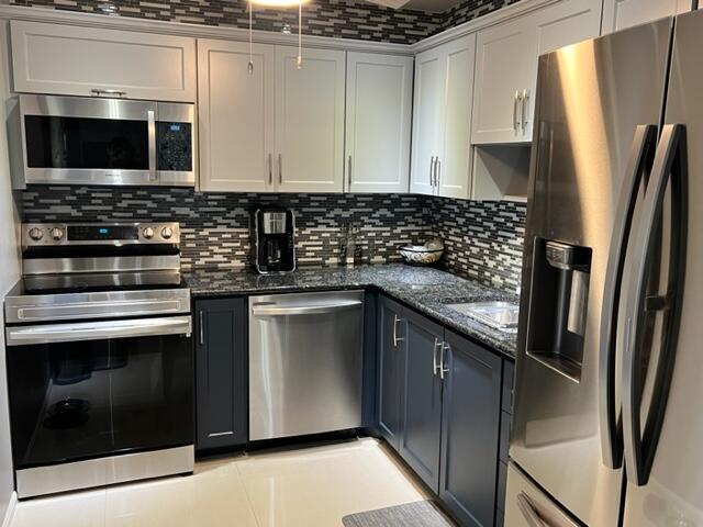 Rare find at this price. Fully remodeled kitchen with brand new appliances and decorator finishes. Redone floors, wood plank wall, and large capacity washer/dryer. Brand new roof, large corner lot, and double walk in closets in master suite. Charming community with oak trees, brick exteriors, and coach lights create a beautiful Florida oasis you can call your own. Welcome home!