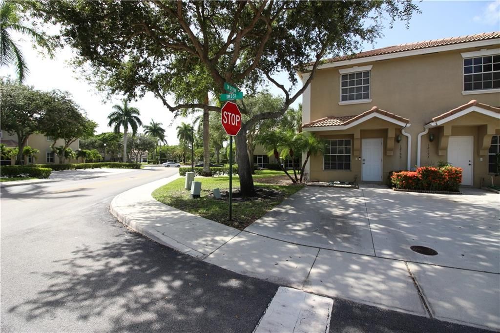 Photo of 12153 SW 3rd St St #12153, Pembroke Pines, FL 33025 (MLS # F10341192)