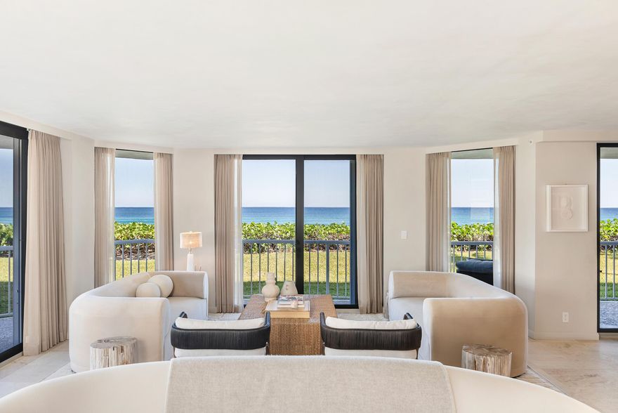 Located directly on the ocean in the prestigious Enclave building on South Ocean Boulevard in Palm Beach, this beautifully designed residence was created by renowned interior designer Noa Santos.  The three bedroom, three bath condominium offers 3,577 total square feet of sophisticated living space with exceptional craftsmanship and high-end finishes throughout. The expansive open living and dining areas are designed for both comfort and elegance, with floor-to-ceiling glass doors that fill the space with natural light and frame the breathtaking ocean views. A wraparound balcony allows for a seamless indoor-outdoor flow with views of the lush green space extending to the Atlantic Ocean creating a serene setting for relaxing and entertaining. The gourmet kitchen is equipped with top-of-the-line Miele appliances, including an oven, microwave combo oven, and stovetop, complemented by a Liebherr refrigerator and freezer. A custom coffee bar and a sophisticated wet bar with an ice maker, fridge, and fluted paneling enhance the home's refined entertaining spaces. A grand entryway and a spacious front hall closet add to the home's thoughtful design. The primary suite is a private retreat featuring two walk-in closets, a built-in desk, a linen closet, and a dedicated shoe closet. Wood floors add warmth and elegance, while terrace doors open to stunning ocean vistas. The spa-inspired primary bath includes dual sinks, a walk-in shower, a separate soaking tub, and a private water closet with a toilet and bidet. The guest suite offers a walk-in closet, an en suite bath with a walk-in shower, and private balcony access with ocean views. The third bedroom opens out onto the terrace with stunning views of the water. An additional bath features a custom vanity and a reeded glass shower enclosure. Additional conveniences include a spacious laundry room with a sink, hanging space, and ample storage, as well as a large front hall closet. Full hurricane doors ensure security and peace of mind, while a Trane A/C system and a water purification system add to the home's modern comforts. The Enclave offers resort-style amenities, including a pool, hot tub, grilling area, tennis court, a state-of-the-art fitness center, and a beautifully appointed party room with a bar and card area. The building also offers a 24-hour doorman and security, a full-time on-site manager, and a gated entrance.  Additional features include two garage parking spaces, bike storage, and a private air-conditioned storage unit.