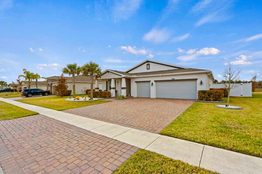 Photo of 7608 NW Deysbrook Lane, Port Saint Lucie, FL 34987 (MLS # R11165212)