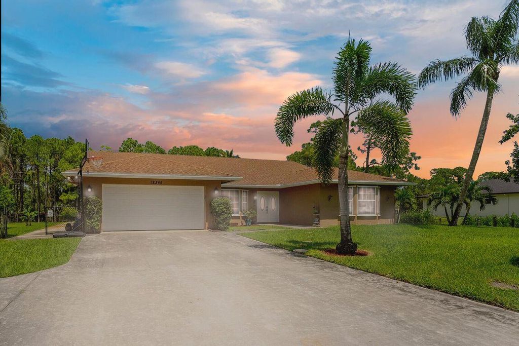 Photo of 18345 44th Place N, The Acreage, FL 33470 (MLS # R10951147)