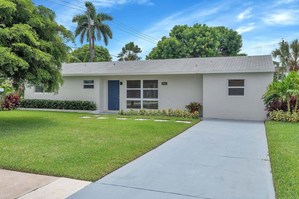 Photo of 2001 Collier Avenue, Lake Worth, FL 33461 (MLS # B26001458)
