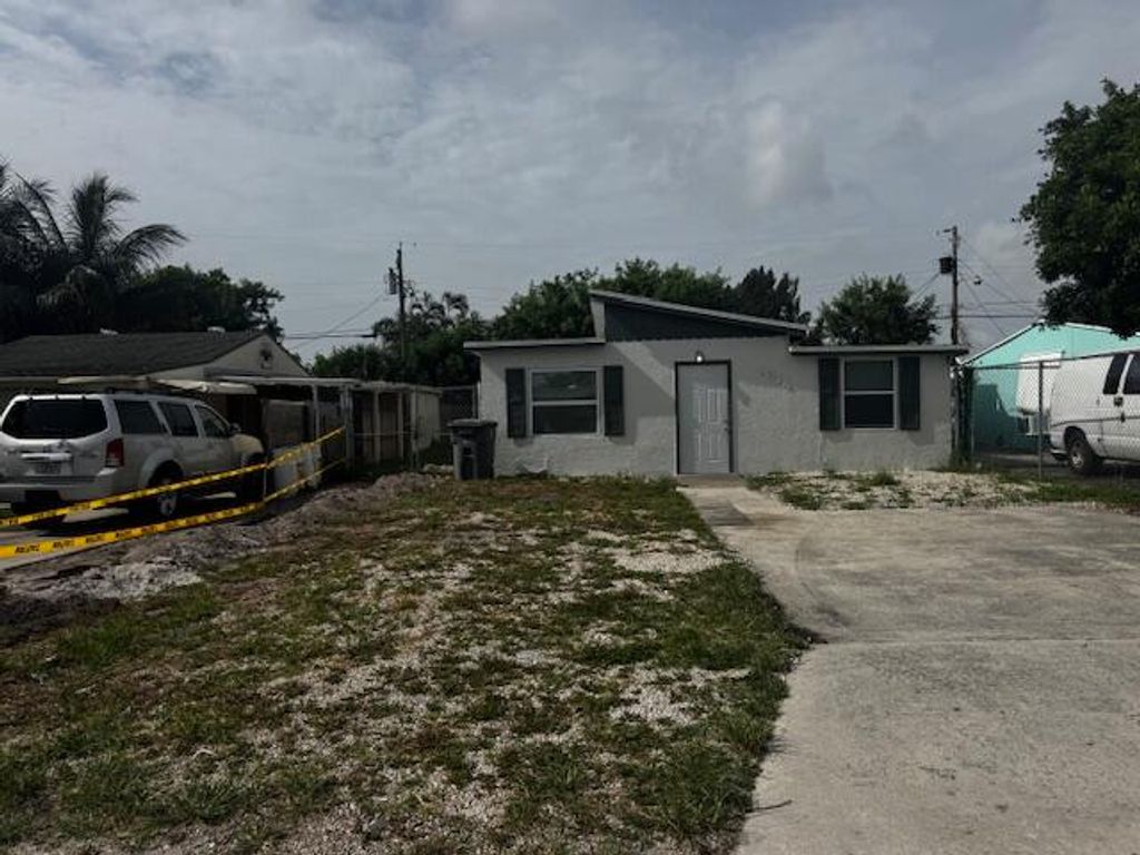 Photo of 1214 Highview Road, Lake Worth, FL 33462 (MLS # R11153816)