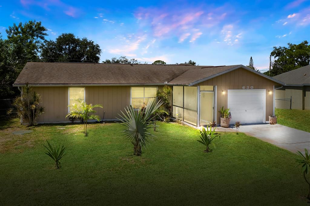 Photo of 630 SW Curry Street St, Port St Lucie, FL 34953 (MLS # R10749545)