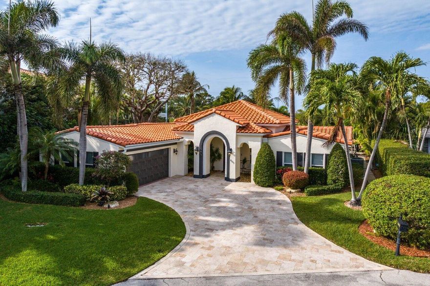 Welcome to 601 Phillips Drive! An outstanding waterfront residence situated on a premier point lot (148') in the Golden Harbour neighborhood! The home has been meticulously updated to live in today but also has unlimited potential for a new custom estate. As you enter the home you're greeted with a bright and airy open-plan with high ceilings. The views of the tropical oasis backyard and out to the deep-water canal are truly amazing. Chef's kitchen features custom cabinets, quartz countertops  48'' Viking Tuscany Range, 54'' Subzero integrated Refrigerator/freezer, 102 bottle Subzero Wine Refrigerator. All impact glass. New S-tile roof in 2020. Spacious primary suite with bay window facing the view and a gorgeous bathroom that has custom cabinets, His & Hers water