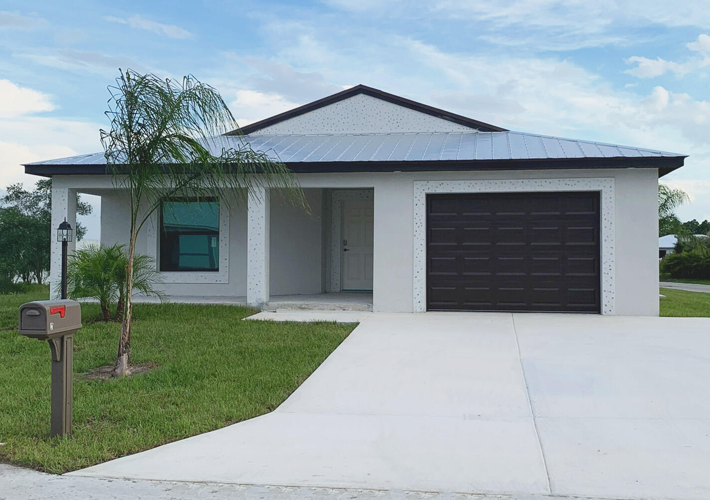Our newest Model: The Platinum offers incredible value with 2 full bedrooms plus a den, 2 baths, and a 1 car garage. Enjoy high vaulted ceilings, a chef's kitchen with a versatile peninsula, Quartz countertops, open concept and large front and rear porch. Built for comfort and peace of mind with solid block construction and impact windows. All models offer additional value and security with 5/8'' true plywood roof sheathing, hurricane tie straps, R-30 insulation, & hip roof designs ensuring big insurance premium discounts plus all our homes are equipped with all energy efficient appliances. Land Lease is $699/mo. and locked in for 99 years. It includes all amenities, trash service & basic lawn maintenance.