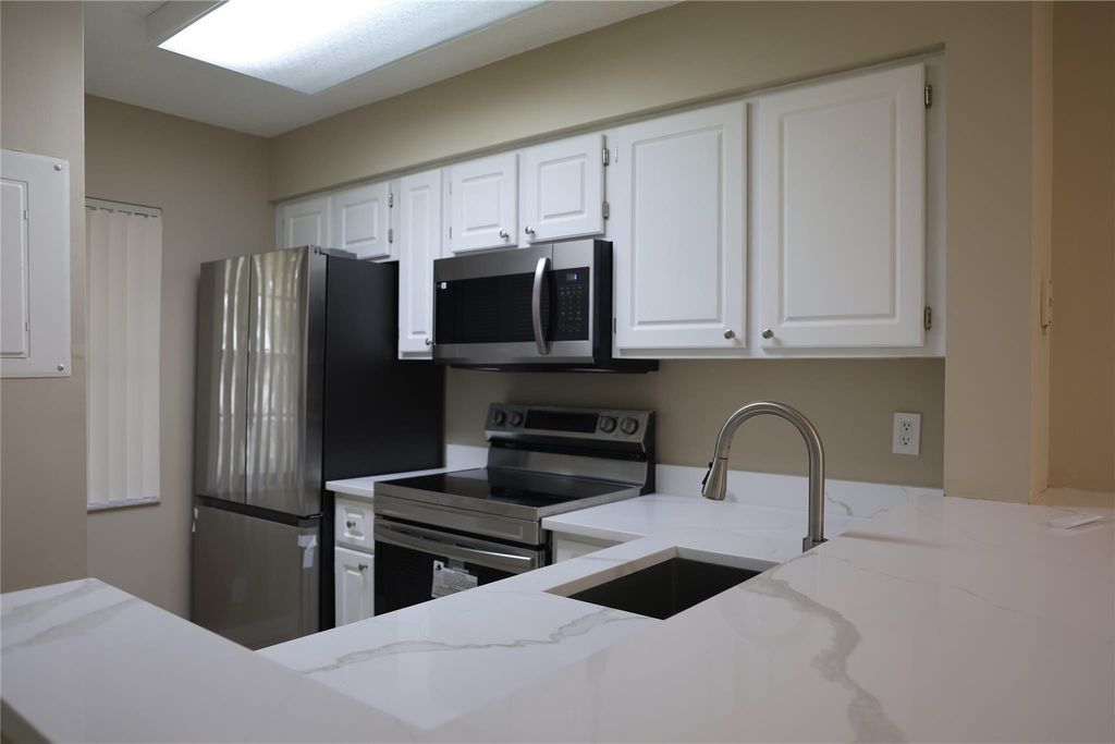 Photo of 2228 N Cypress Bend Drive #407, Pompano Beach, FL 33069 (MLS # F10551808)