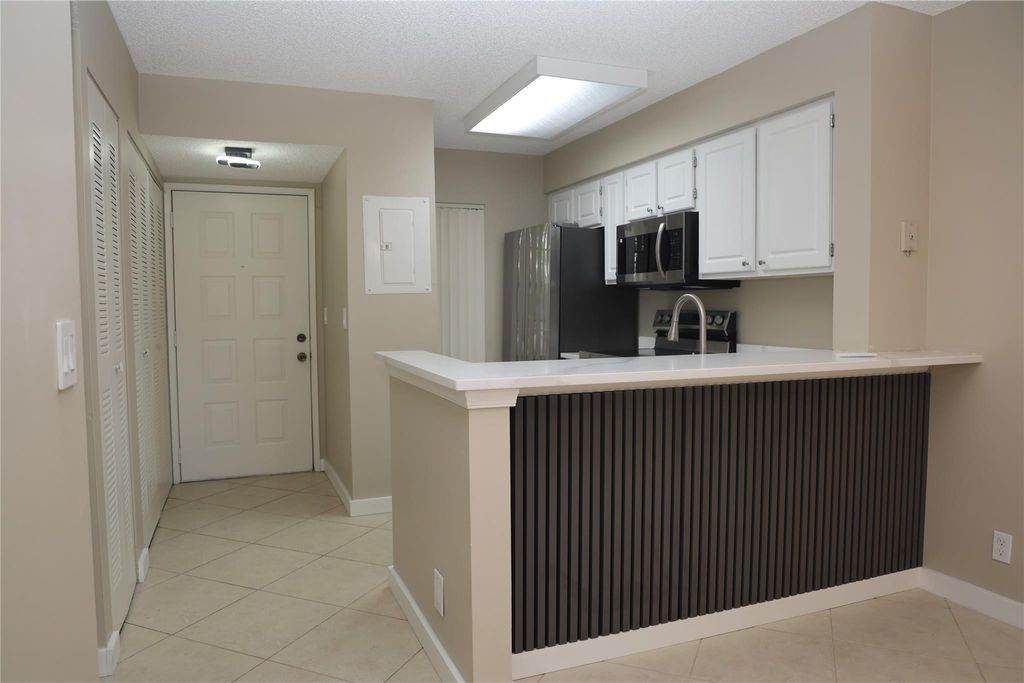 Photo of 2228 N Cypress Bend Drive #407, Pompano Beach, FL 33069 (MLS # F10551808)