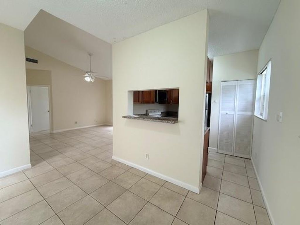 Photo of 671 Cypress Lake Boulevard #D, Pompano Beach, FL 33064 (MLS # F10552126)