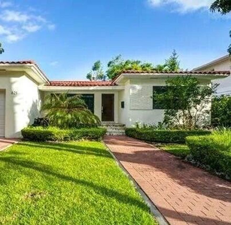 Bright and beautifully updated home featuring spacious open living areas and abundant natural light throughout. The modern kitchen includes stone countertops, stainless appliances, and clean finishes. Multiple living spaces offer flexibility for lounging, entertaining, or a home office. Generous bedrooms provide a calm, linen-inspired retreat. A private tropical deck surrounds the pool, creating a peaceful oasis perfect for relaxing or entertaining. Enjoy stylish indoor-outdoor living in a serene setting.