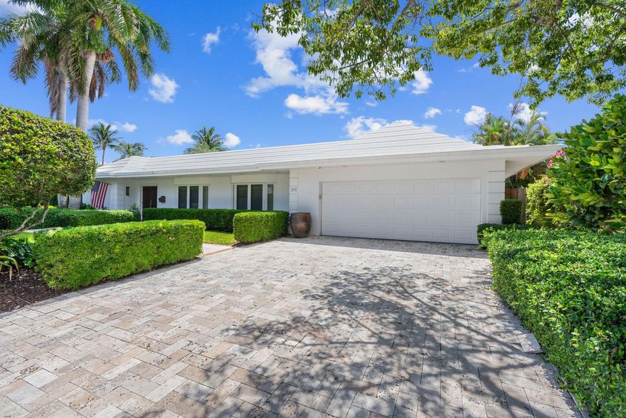 100' Waterfront Home In Sought-After Country Club Estates Offers The Best Of South Florida Living. This 3-Bed, 3.5-Bath Residence Features A Thoughtfully Updated Layout With Elegant Finishes Including Travertine And Wood Floors, Crown Moulding, And Tray Ceilings. The Chef’s Kitchen Boasts Custom Cabinetry, Granite Counters, And Premium Appliances. Enjoy Seamless Indoor-Outdoor Living With A Heated Pool, Outdoor Bar, And Tropical Landscaping. Dock Your Boat Out Back With Water/Electric And A Lift In Place. All Bedrooms Are Ensuite, Including A Luxurious Primary Suite With Water Views And Spa-Style Bath. Impact Windows/Doors, 2-Car Garage. A True Waterfront Gem!
