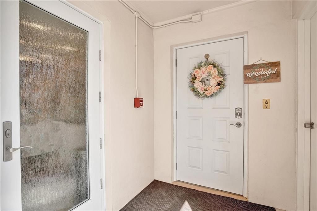 Photo of 2661 S Course Dr #401, Pompano Beach, FL 33069 (MLS # F10319403)