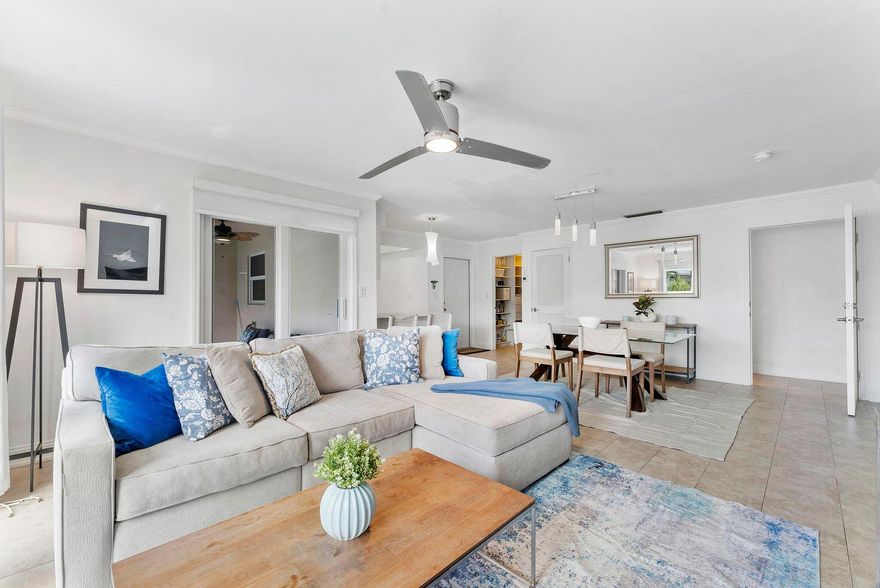 Gorgeous corner unit professionally renovated with brand new kitchen with quartz countertops and stainless steel appliances. Large open plan living and dining area great for entertaining.  It is located across the street from intracoastal and short walk to the beach. Enjoy some intracoastal views from your private balcony, overlooking the pool area. This unit has 2 master bedrooms with en suite bathrooms(contemporary bath fixtures) and walk-in closets. The building boasts new roof, new landscaping and outdoor lighting.