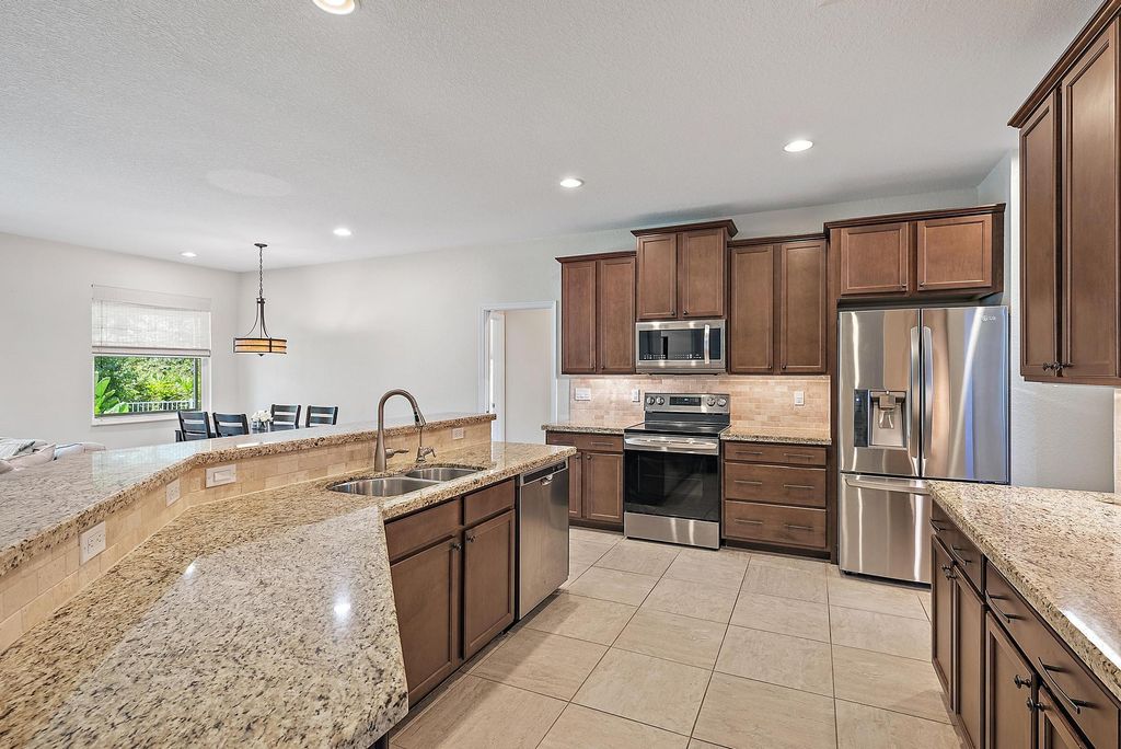 Photo of 1208 SE Conference Circle, Stuart, FL 34997 (MLS # R11088971)