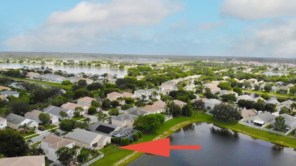 Photo of 137 Canterbury Place, Royal Palm Beach, FL 33414 (MLS # B26018125)