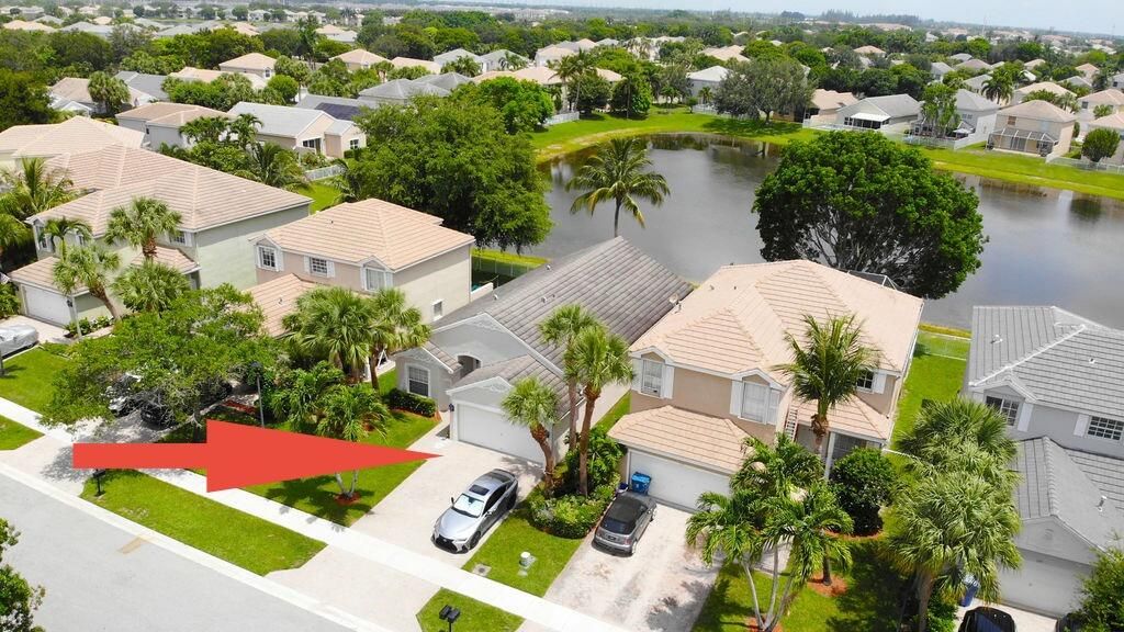 Photo of 137 Canterbury Place, Royal Palm Beach, FL 33414 (MLS # B26018125)