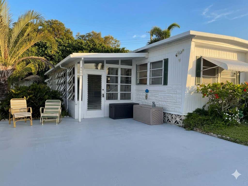 Photo of 4084 Bougainvillea Road W, Boynton Beach, FL 33436 (MLS # B26060467)