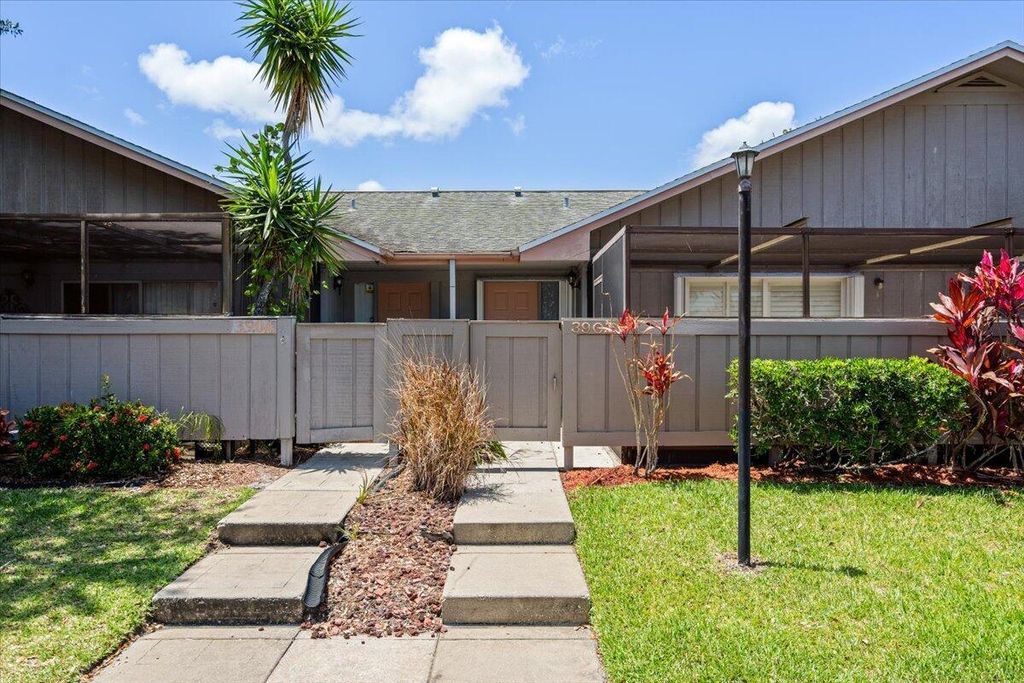 Photo of 3902 NW Cinnamon Tree Circle, Jensen Beach, FL 34957 (MLS # R11095451)