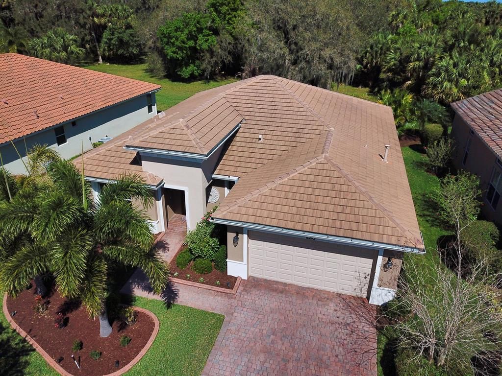 Photo of 11242 SW Apple Blossom Trail, Port Saint Lucie, FL 34987 (MLS # R10694757)