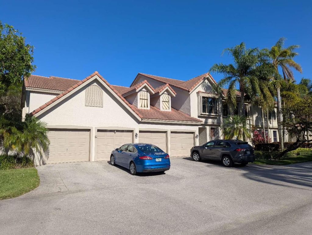 Photo of 5760 Coach House Circle #A, Boca Raton, FL 33486 (MLS # R11091177)